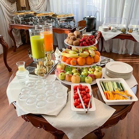 Gregory Boutique Hotel Chişinau Exteriör bild A buffet at a hotel
