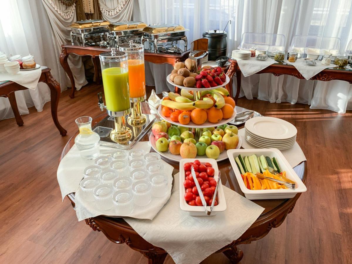 Gregory Boutique Hotel Chişinau Exteriör bild A buffet at a hotel