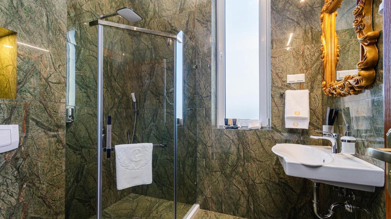Gregory Boutique Hotel Chişinau Exteriör bild A shower enclosure