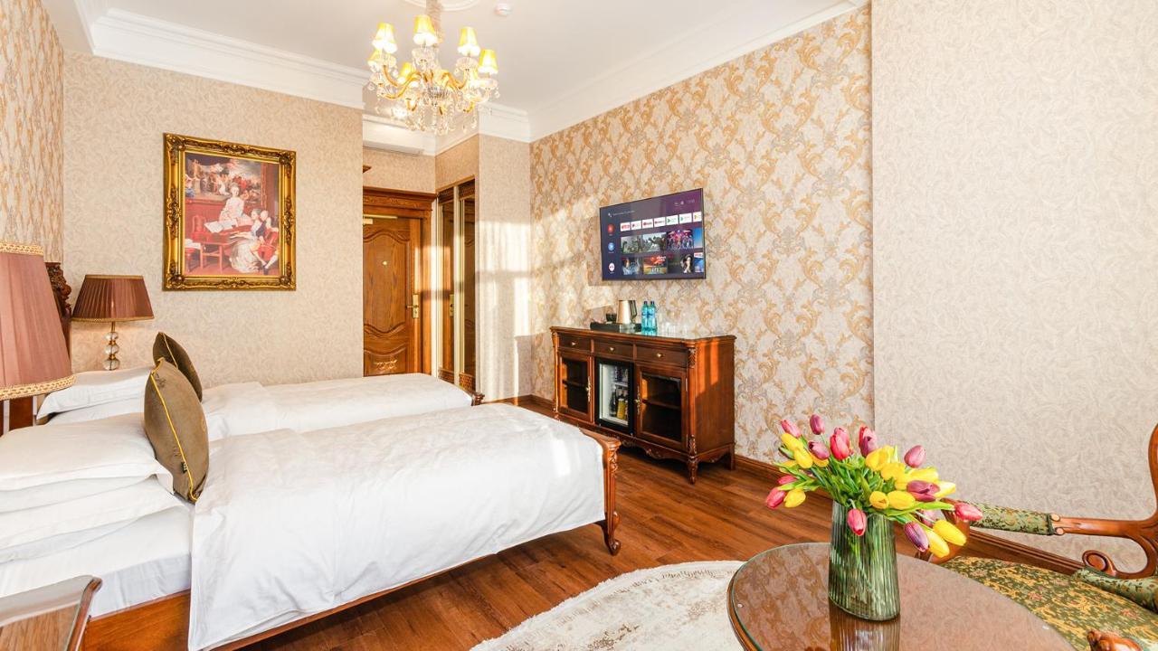Gregory Boutique Hotel Chişinau Exteriör bild A room at the hotel