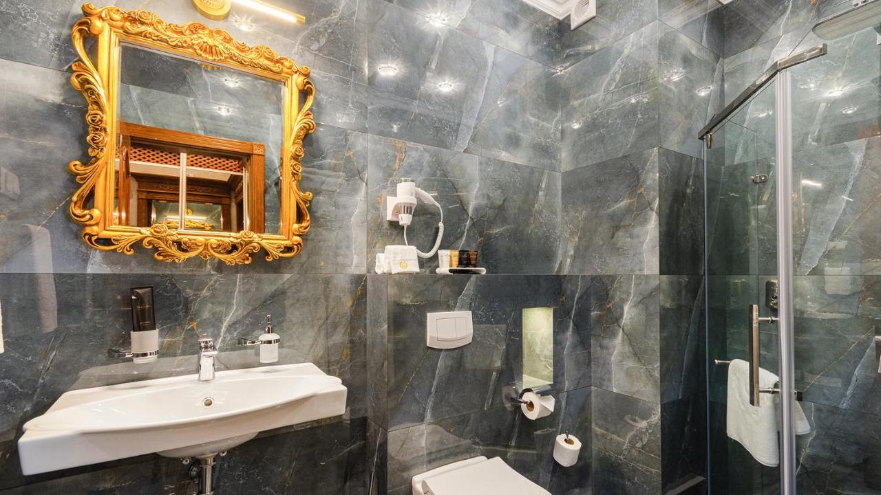 Gregory Boutique Hotel Chişinau Exteriör bild Bathroom with marble walls